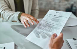 closeup candidate giving his cv while applying job office